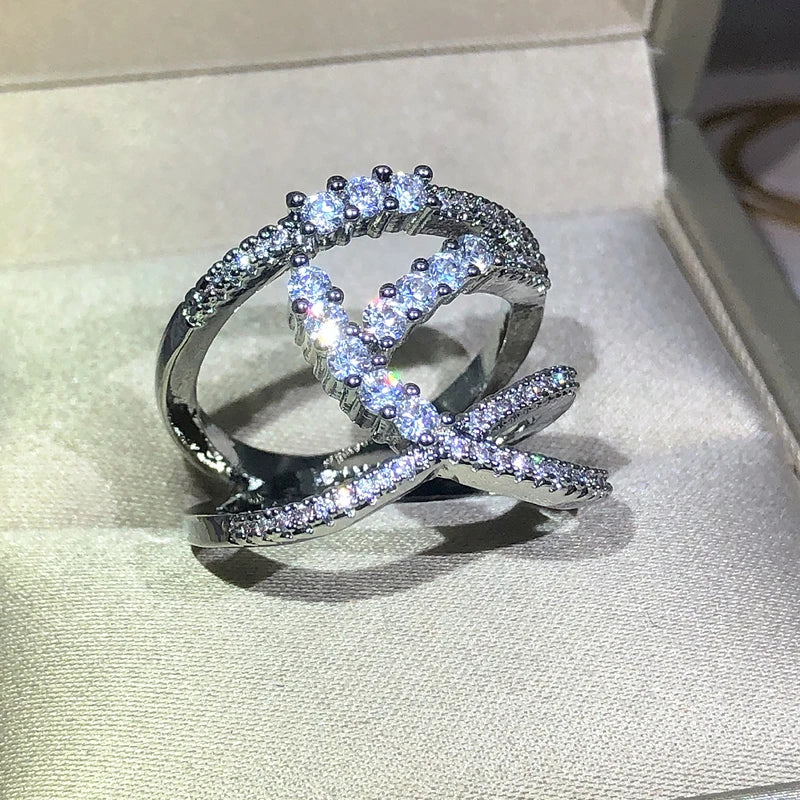 Creative wrap-around zircon sterling silver ring